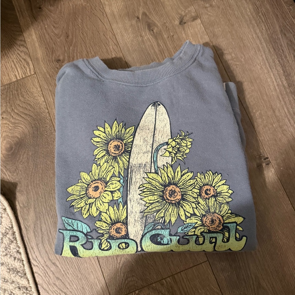 Rip Curl Blue Sweatshirt with Sunflower and Surfboard Design